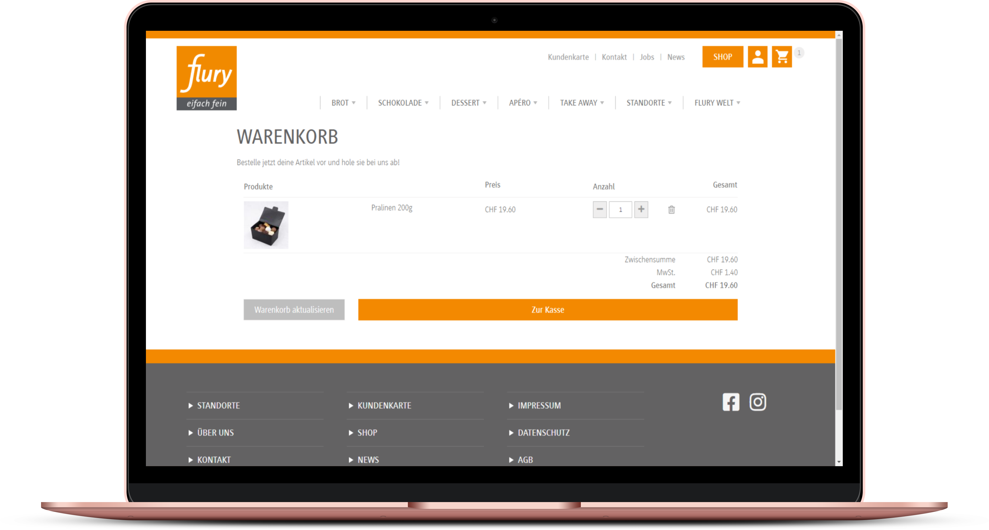 Laptop mit geöffnetem Warenkorb von einer online Backerei