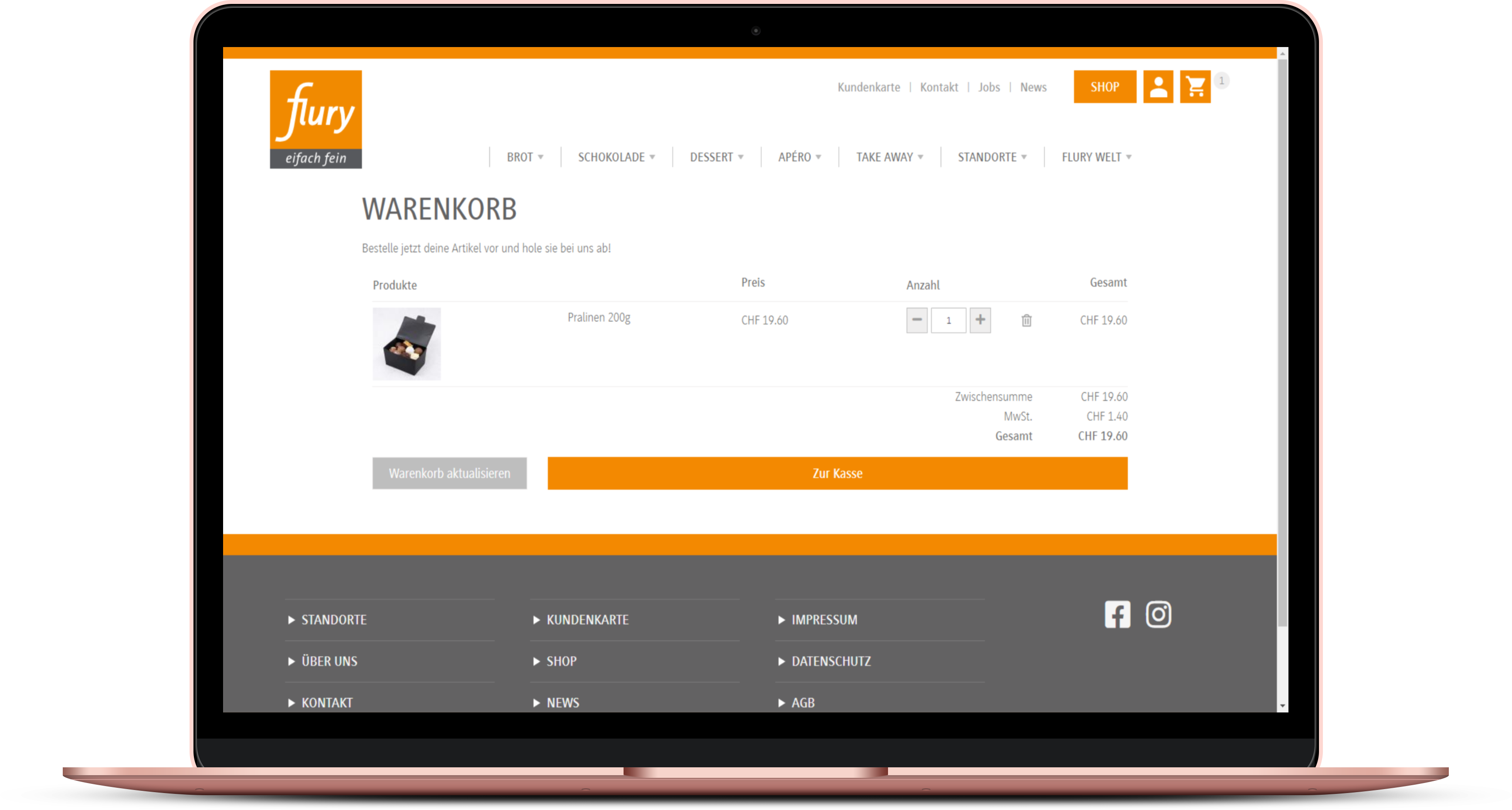 Laptop mit geöffnetem Warenkorb von einer online Bäckerei Laptop mit geöffnetem Warenkorb von einer online Bäckerei